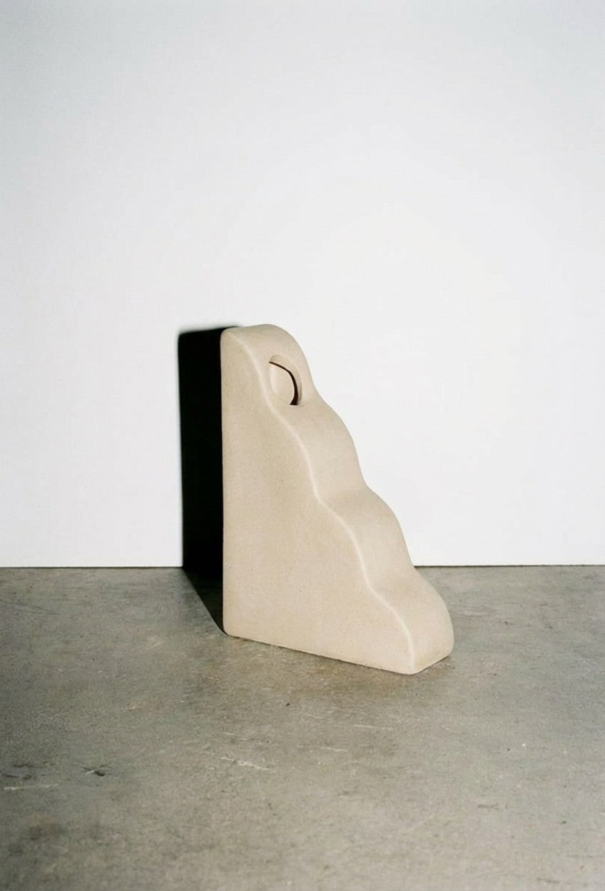 Tsuchi wedge vase styled on a shelf