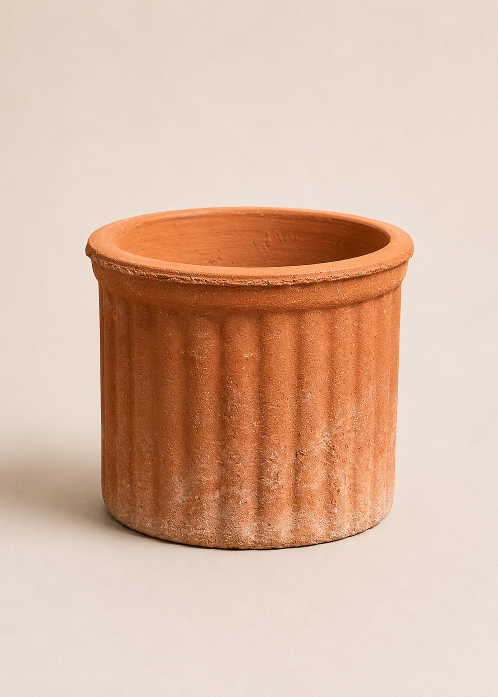 Colonna ribbed terracotta planter studio shot