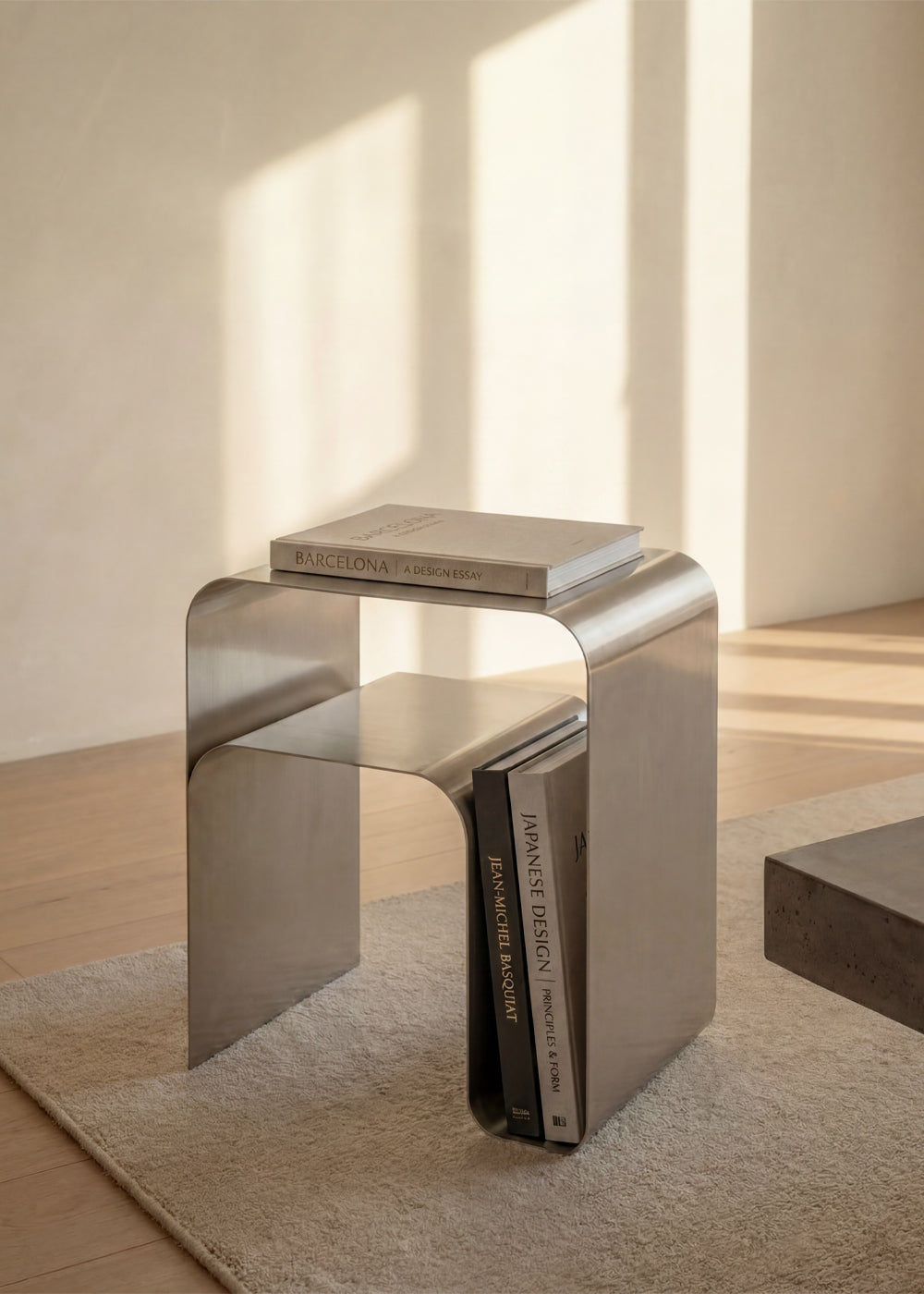 Hashi polished steel side table in a living room
