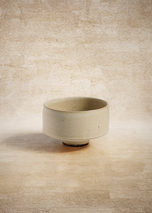 Handmade stoneware deep dish, measuring W12cm x H7.5cm. This collection of stoneware minimalism includes a flat, deep, and wide dish, each representing timelessness. Perfect for culinary creations, the Stone Dish Set offers versatility and beauty where simplistic design meets functionality.