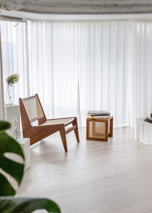 A Vine-Woven Wooden Rattan Side Table, seamlessly integrating vine-woven rattan with wood, showcasing intricate weaving and adding unique texture to your space. Crafted from solid wood, hand-crafted, with dimensions of W35cm x H35cm.