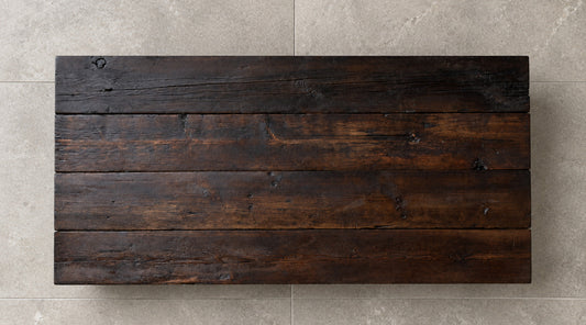 Hira coffee table top from above, showing dark reclaimed oak planks
