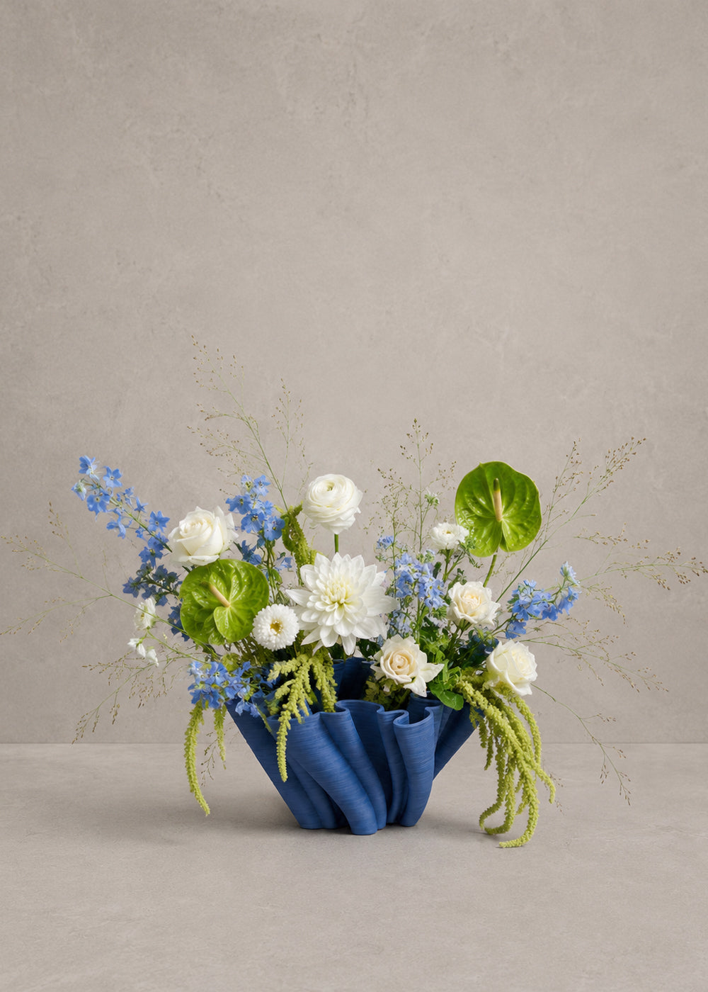 Sora indigo vase styled with fresh flowers