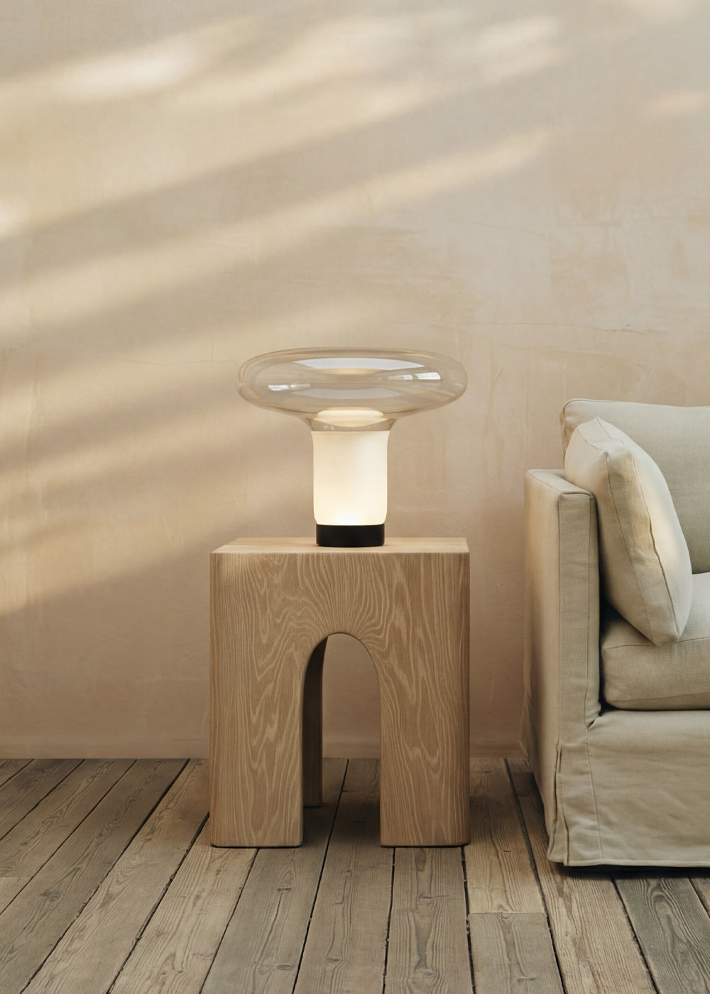 Hikari glass table lamp on a side table