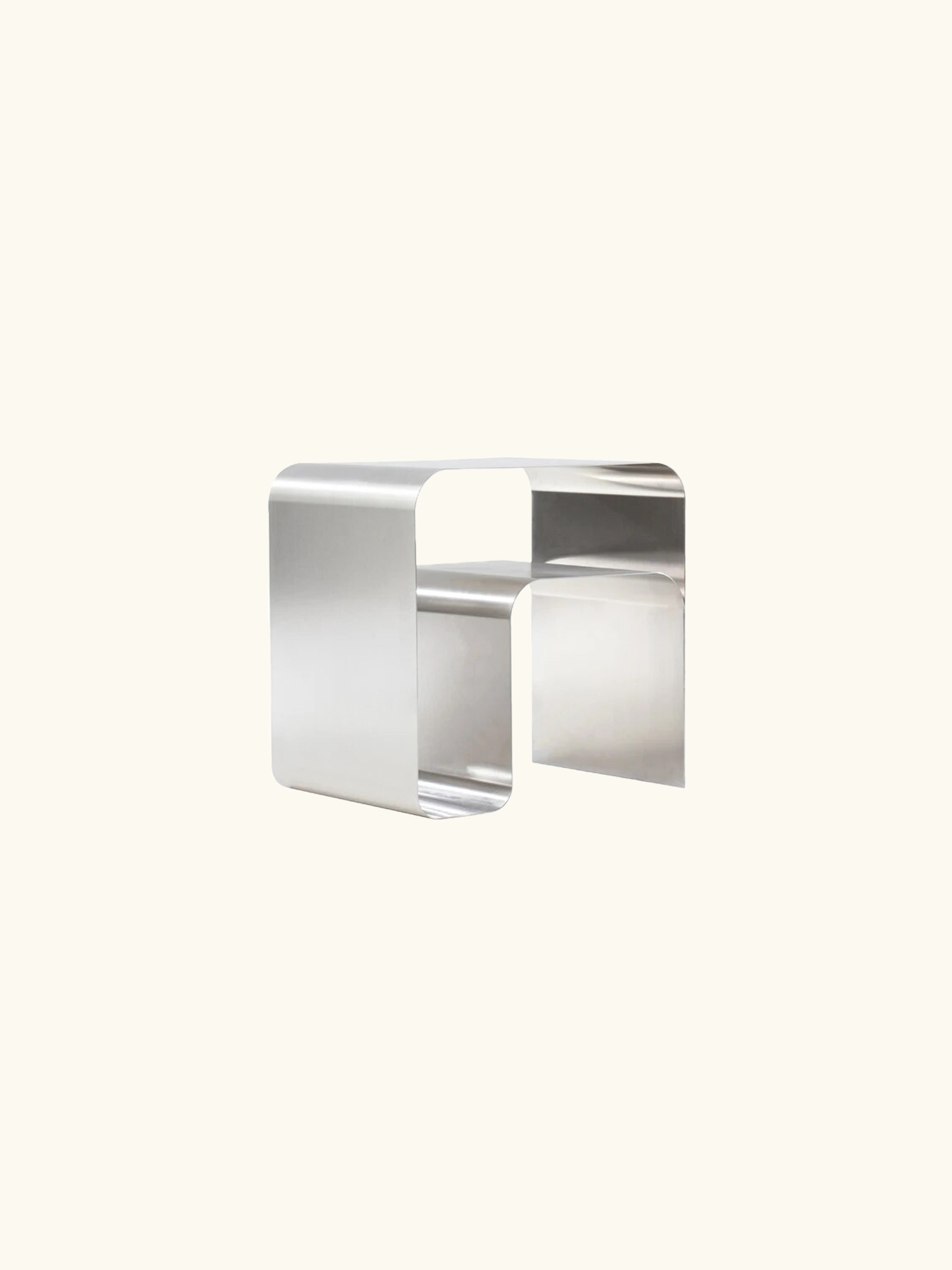 A modern Stainless Steel Side Table with sleek stainless steel construction, combining industrial style and functionality. Features a top surface for displaying items and practical horizontal and vertical storage space inside. Dimensions: W45 x H45 x D35